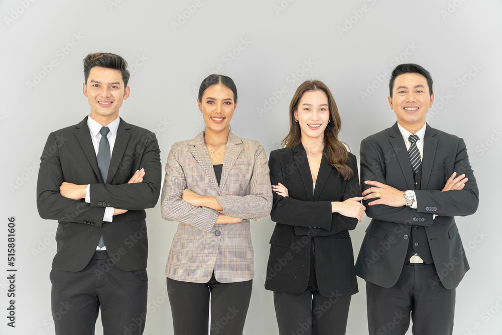 Asian businessman looking at the camera Working and meeting at the office at the company with colleagues at the back Asian businessman looking at the camera Working and meeting at the office at the company with colleagues at the back