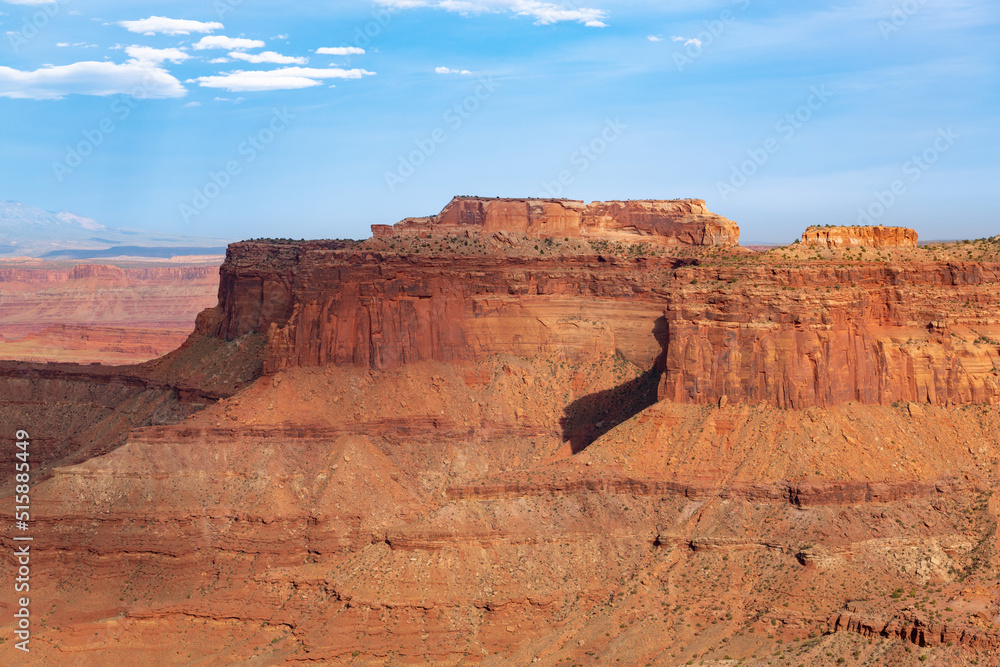 High, colorful red rock cliffs and mesas above a canyon in Canyonlands National Park, Utah High, colorful red rock cliffs and mesas above a canyon in Canyonlands National Park, Utah