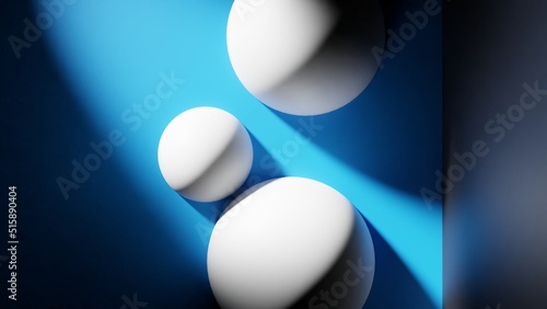 3D rendering. 3D illustration. Top view of three spheres with intense diagonal light illuminating blue room.