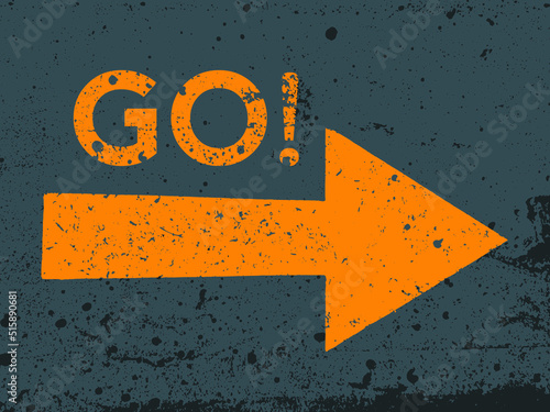 Grunge yellow arrow on gray texture with Go text - motivational slogan
