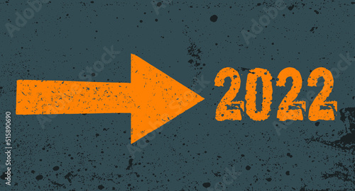 Grunge yellow arrow on gray texture pointing to 2022 next. Background 2022 New Year future vision concept. 