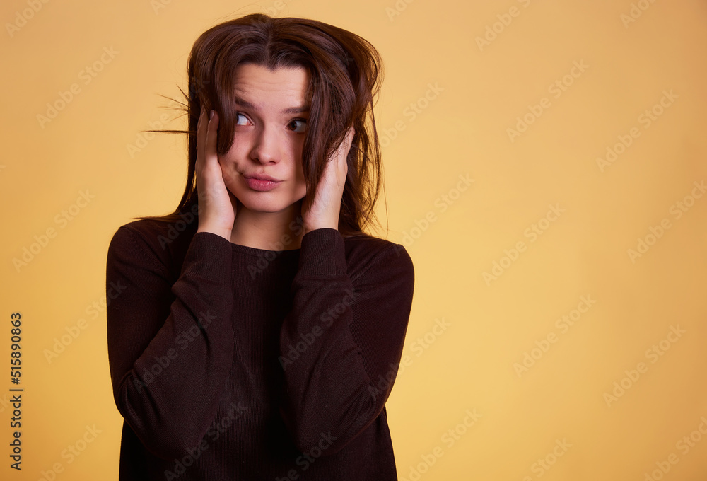 Young woman wearing casual clothes crazy and scared with hands on head, afraid and surprised of shock with smile. People sincere emotions lifestyle concept. Mock up copy space. Young woman wearing casual clothes crazy and scared with hands on head, afraid and surprised of shock with smile. People sincere emotions lifestyle concept. Mock up copy space.