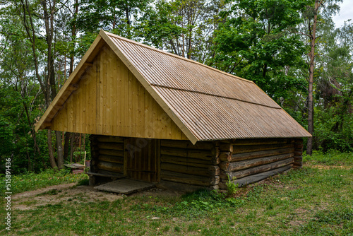 Old wooden house in the forest.