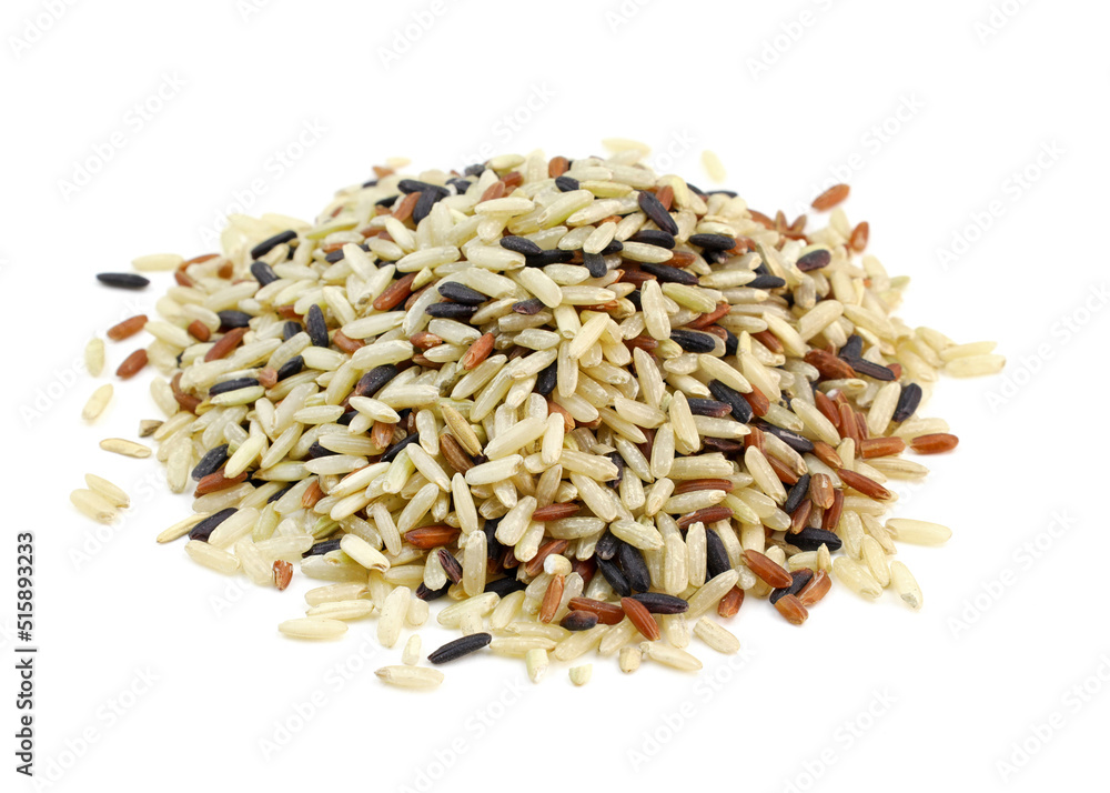 Pile of Organic rice close up. Mixed rice on white background. White, brown and black rice mixed together.