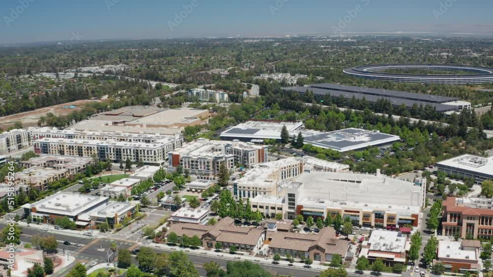 Aerial orbiting shot of the commercial center in Cupertino San Jose of Bay Area Aerial orbiting shot of the commercial center in Cupertino San Jose of Bay Area