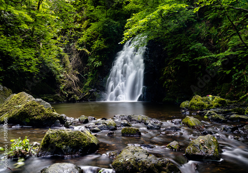 view of the picturesque Gleno Waterfall in the Glens of Antrim near Larne photo