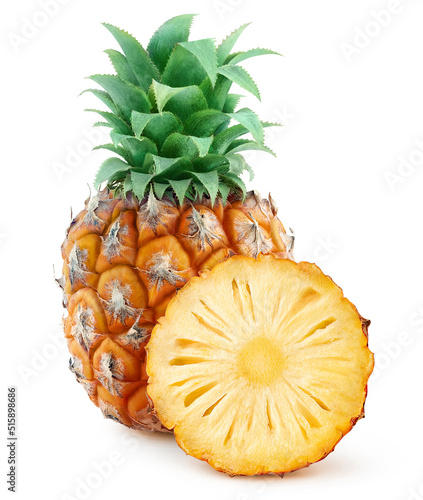 One whole pineapple and a slice isolated on white background