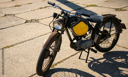 Retro moped in the parking lot.