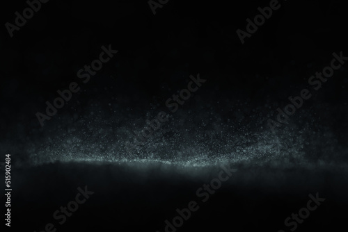 Abstract blurred dotted wave on clean black background.