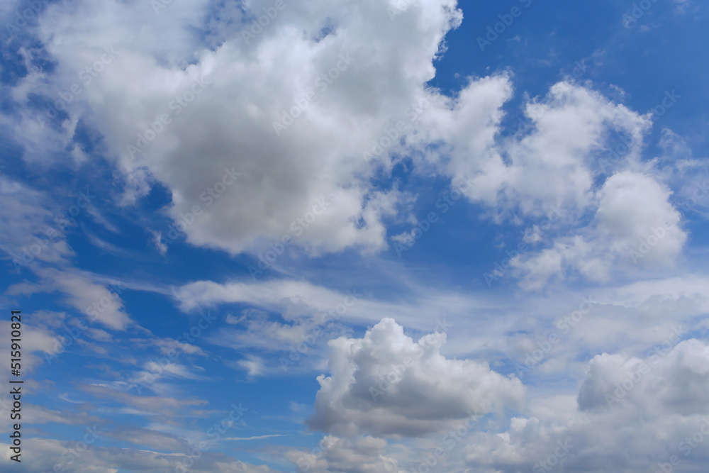 Beautiful cumulus clouds in sunny day. Atmosphere background or wallpaper Beautiful cumulus clouds in sunny day. Atmosphere background or wallpaper