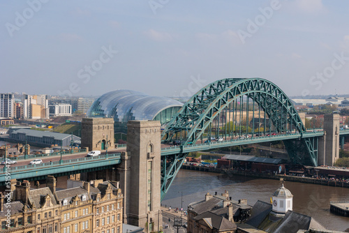 Newcastle upon Tyne UK: 15th April 2022 a panoramic shot of the famous Newcastle Quayside and Tyne Bridge from a high viewpoint (at Above in the Vermont Hotel) on a hazy day