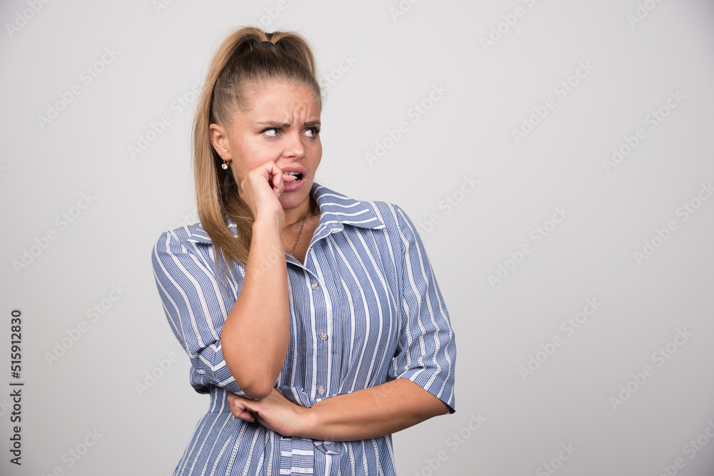 Young angry woman looking at something Young angry woman looking at something