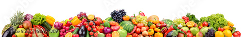 Bright berries, fruits and vegetables isolated on white