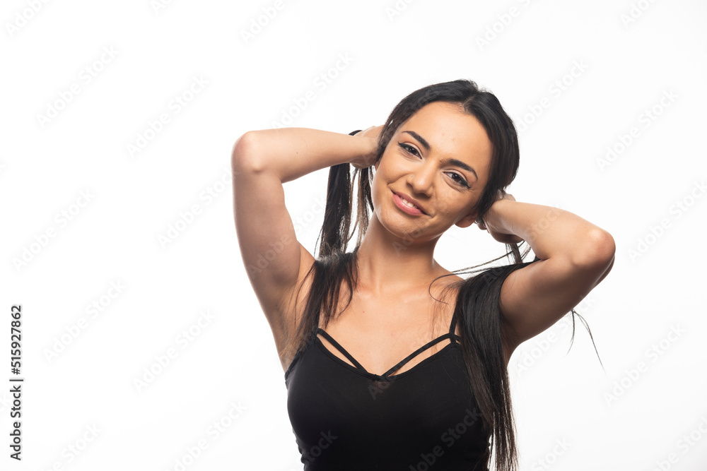 Portrait of young woman posing on white background Portrait of young woman posing on white background