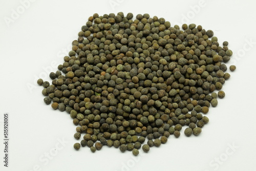 Fotografie Common vetch (Vicia sativa) grains on the white background