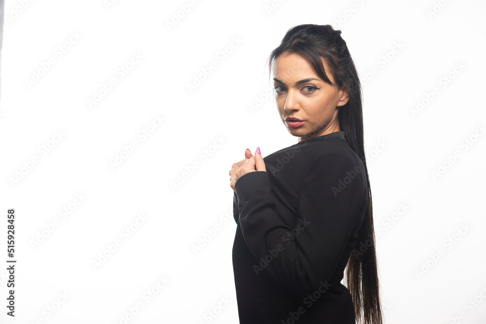 Business woman posing on white background Business woman posing on white background