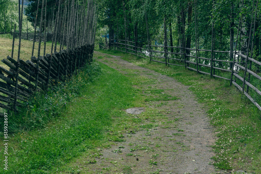 A road between wooden fences of Valdresmusea Folk Museum, Fagernes, Oppland, Norway.
