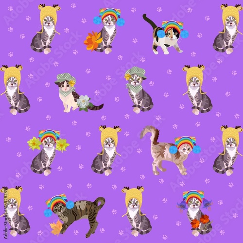Fashionista cats in knitted hats and their footprints on a violet background of an amethyst shade in vector. Seamless print for fabric for kids.
