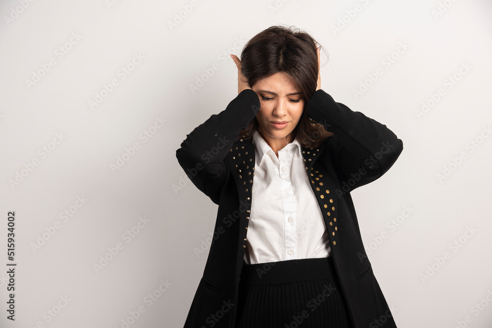 Portrait of young woman having headache Portrait of young woman having headache