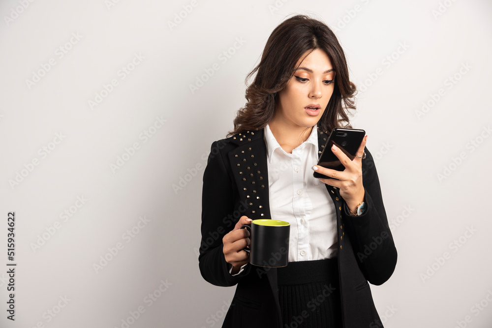 Female office worker surprised about news Female office worker surprised about news