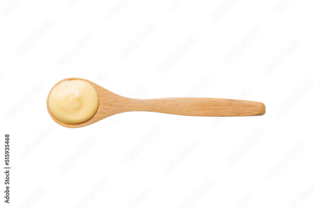 wooden spoon of cheese sauce isolated on white background. top view wooden spoon of cheese sauce isolated on white background. top view