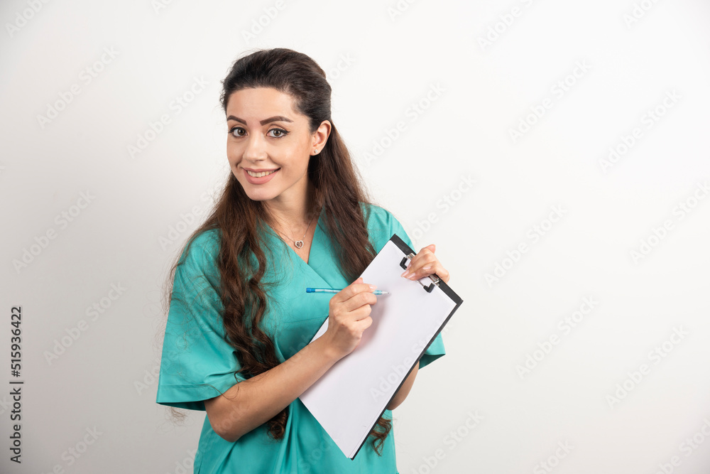 Portrait of female healthcare worker on white background Portrait of female healthcare worker on white background