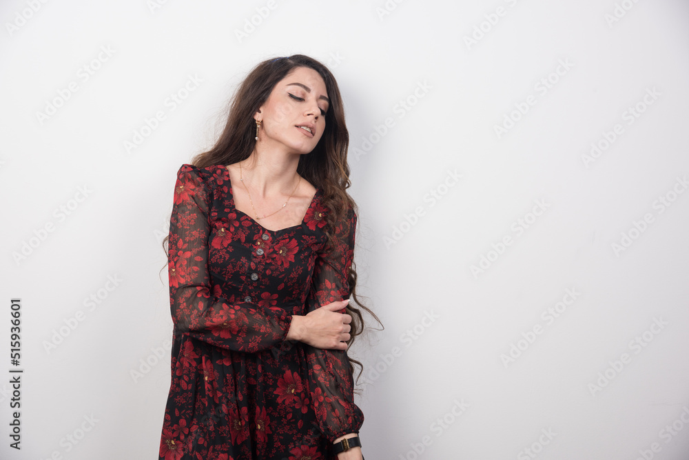 Portrait of long haired woman looking at her side Portrait of long haired woman looking at her side
