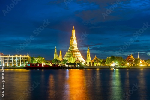 Wat Arun temple with Chao Phraya River At Night in Bangkok Thailand © i am way