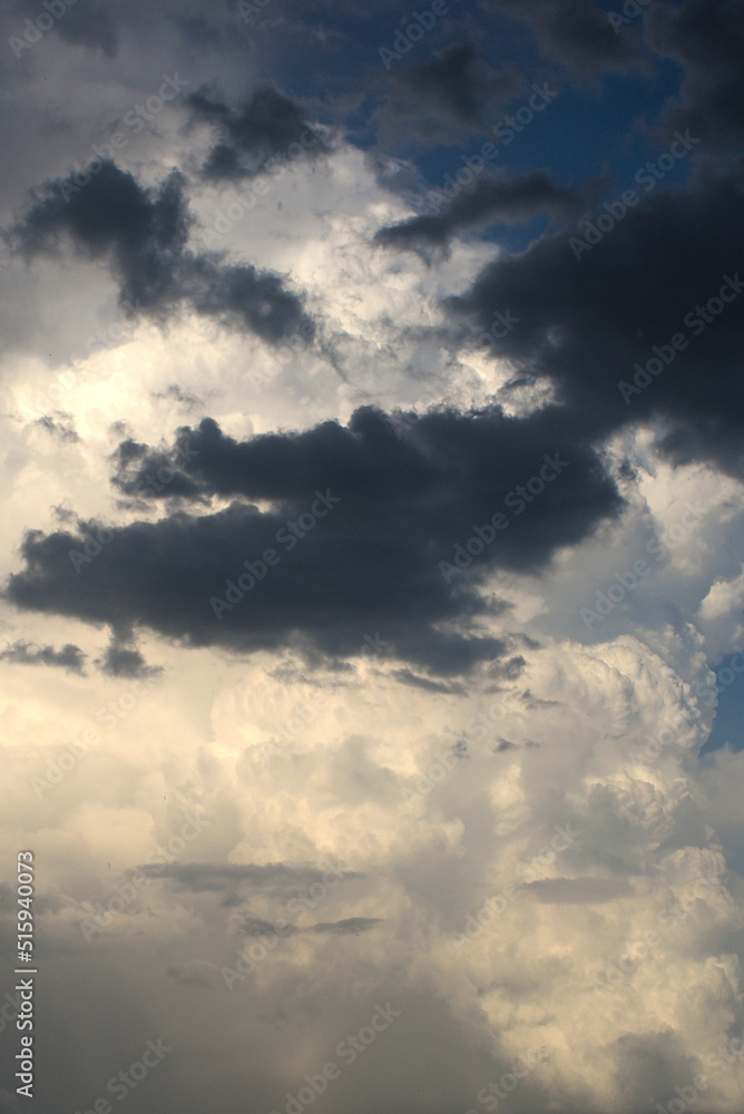 background of light and dark clouds on blue sky, background