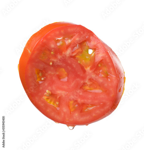 Round piece of red ripe tomato isolated on white background