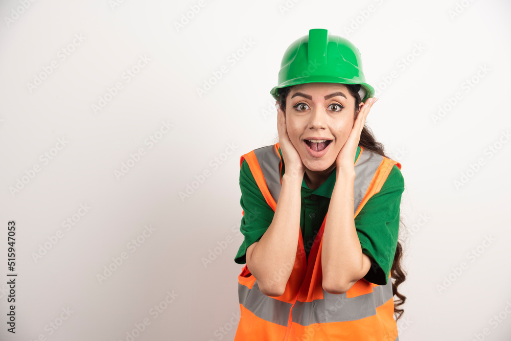 Successful woman in hardhat wearing uniform Successful woman in hardhat wearing uniform