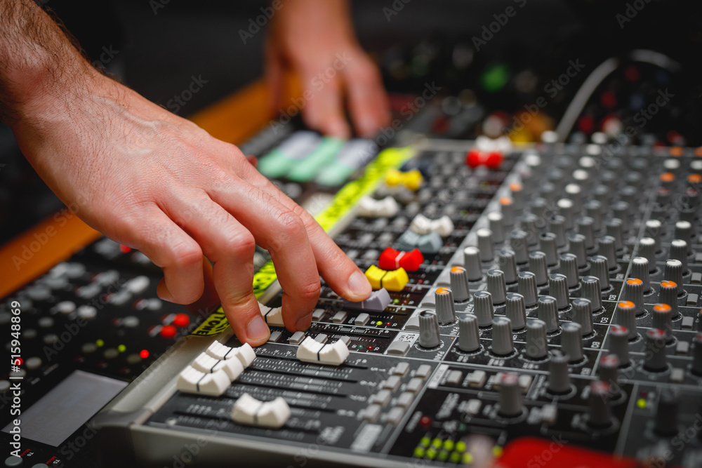 The surface with faders of a sound mixer controller. The surface with faders of a sound mixer controller.