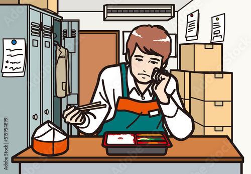 アルバイトの男性　憂鬱な食事　休憩室