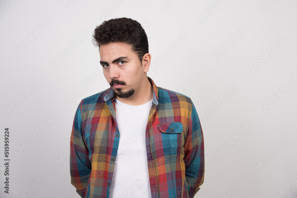 Angry handsome guy looking at camera Angry handsome guy looking at camera