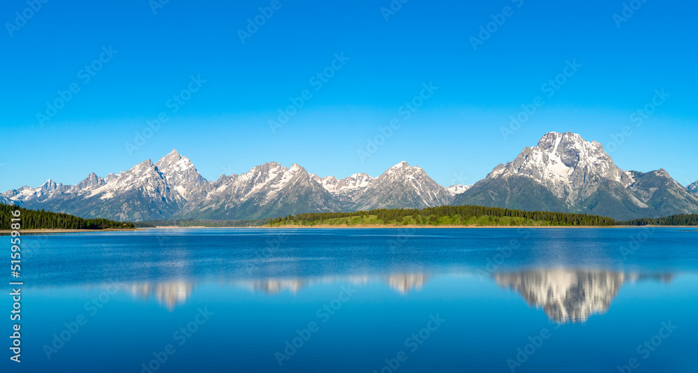 landscape of snow mountain in grand teton reflecting in the lake landscape of snow mountain in grand teton reflecting in the lake