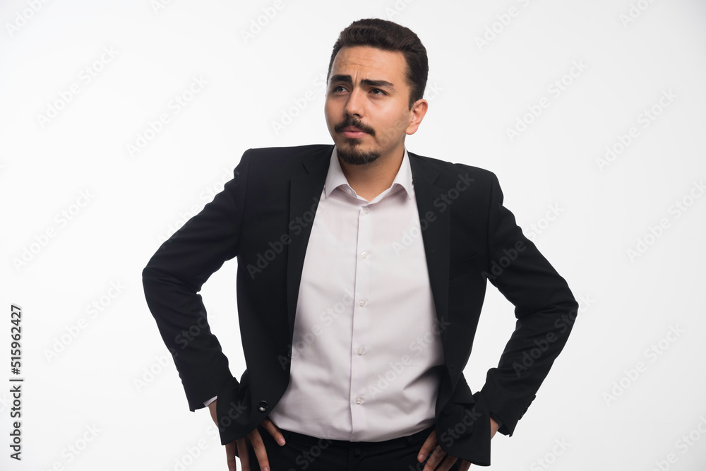 A businessman in dress code looks stressed A businessman in dress code looks stressed