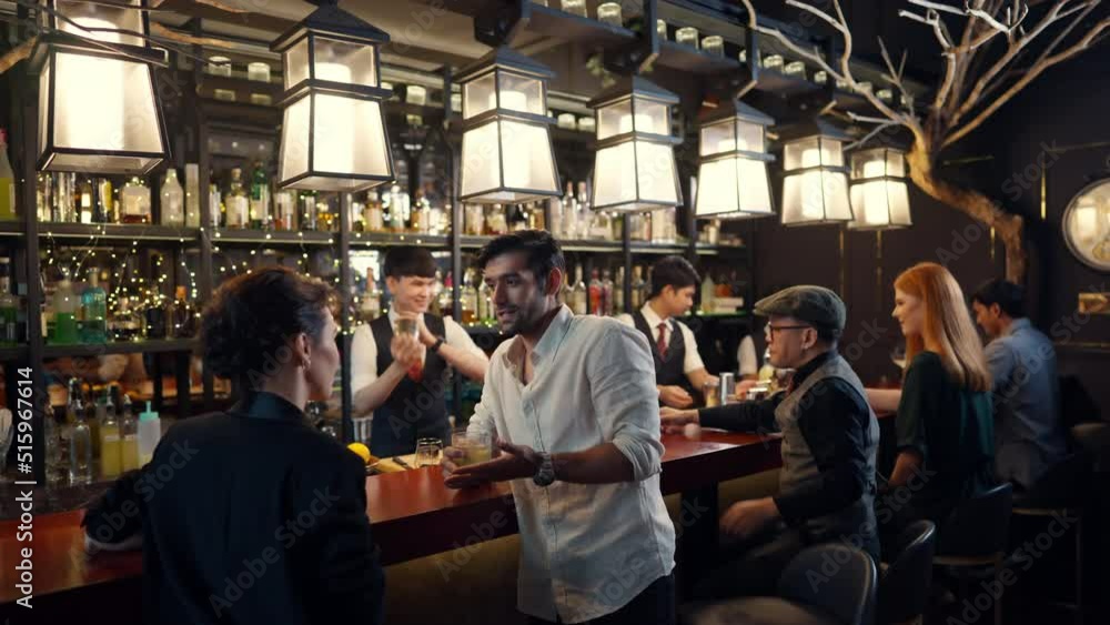 4K Group of People man and woman enjoy hangout nightlife celebrating party drinking cocktail beverage at luxury bar. Bartender preparing alcoholic drink serving customer on bar counter at nightclub 4K Group of People man and woman enjoy hangout nightlife celebrating party drinking cocktail beverage at luxury bar. Bartender preparing alcoholic drink serving customer on bar counter at nightclub