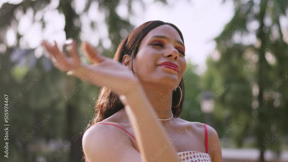 Transgender woman dancing outdoors Transgender woman dancing outdoors