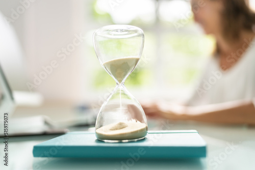 Late Invoice And Billing Deadline With Hourglass