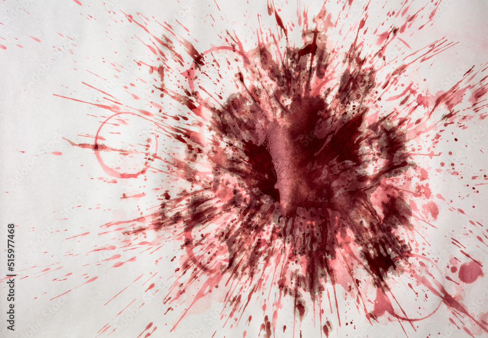 Red wine stains on paper.