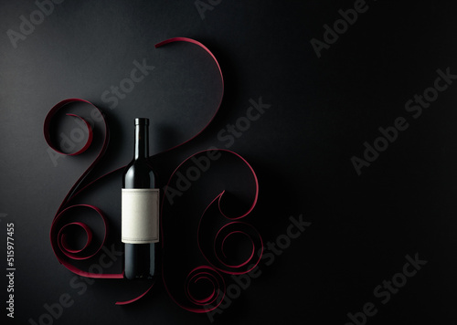 Bottle of red wine with old empty label. © Igor Normann