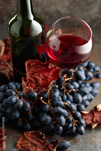 Red wine and blue grapes.