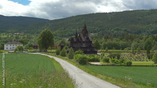 heddal stave church wood cathedral built 1300 century triple nave distance cloudy sky norway photo