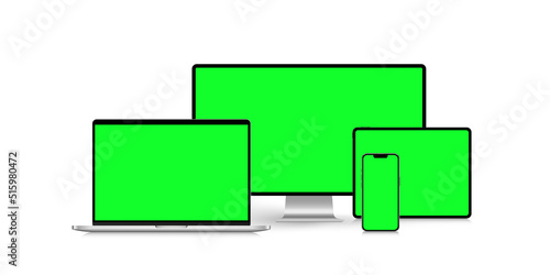 A set of isolated smart devices mockup with blank chroma key screen: smartphone, tablet, laptop and desktop on white background. Stock royalty free vector illustration	