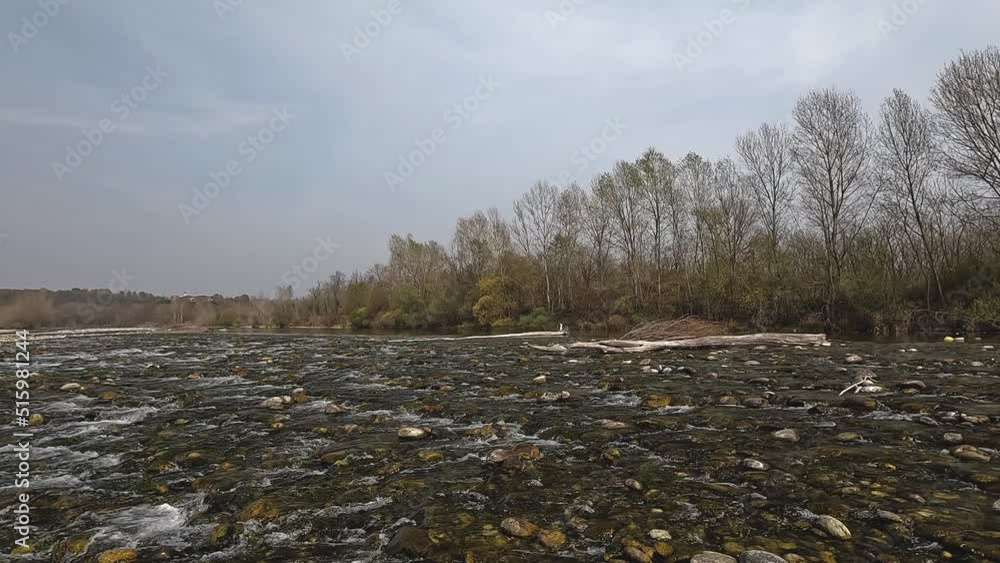stream with rocks flows downstream stream with rocks flows downstream