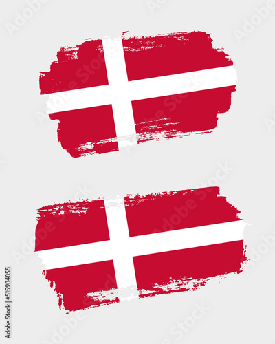 Set of two creative brush painted flags of Denmark country with solid background