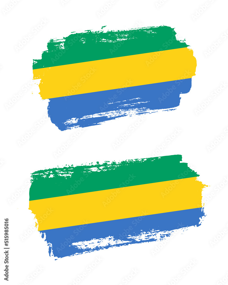 Obraz premium Set of two creative brush painted flags of Gabon country with solid background
