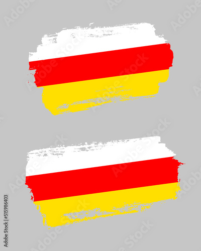Set of two creative brush painted flags of South Ossetia country with solid background