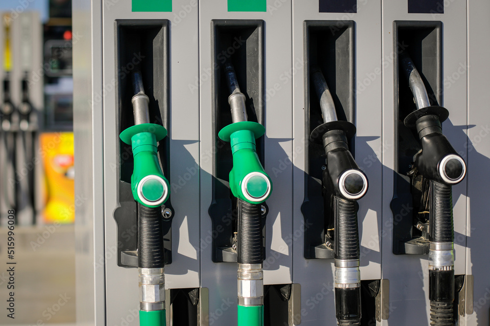 Shallow depth of field (selective focus) details with fuel pumps at a gas station. Shallow depth of field (selective focus) details with fuel pumps at a gas station.