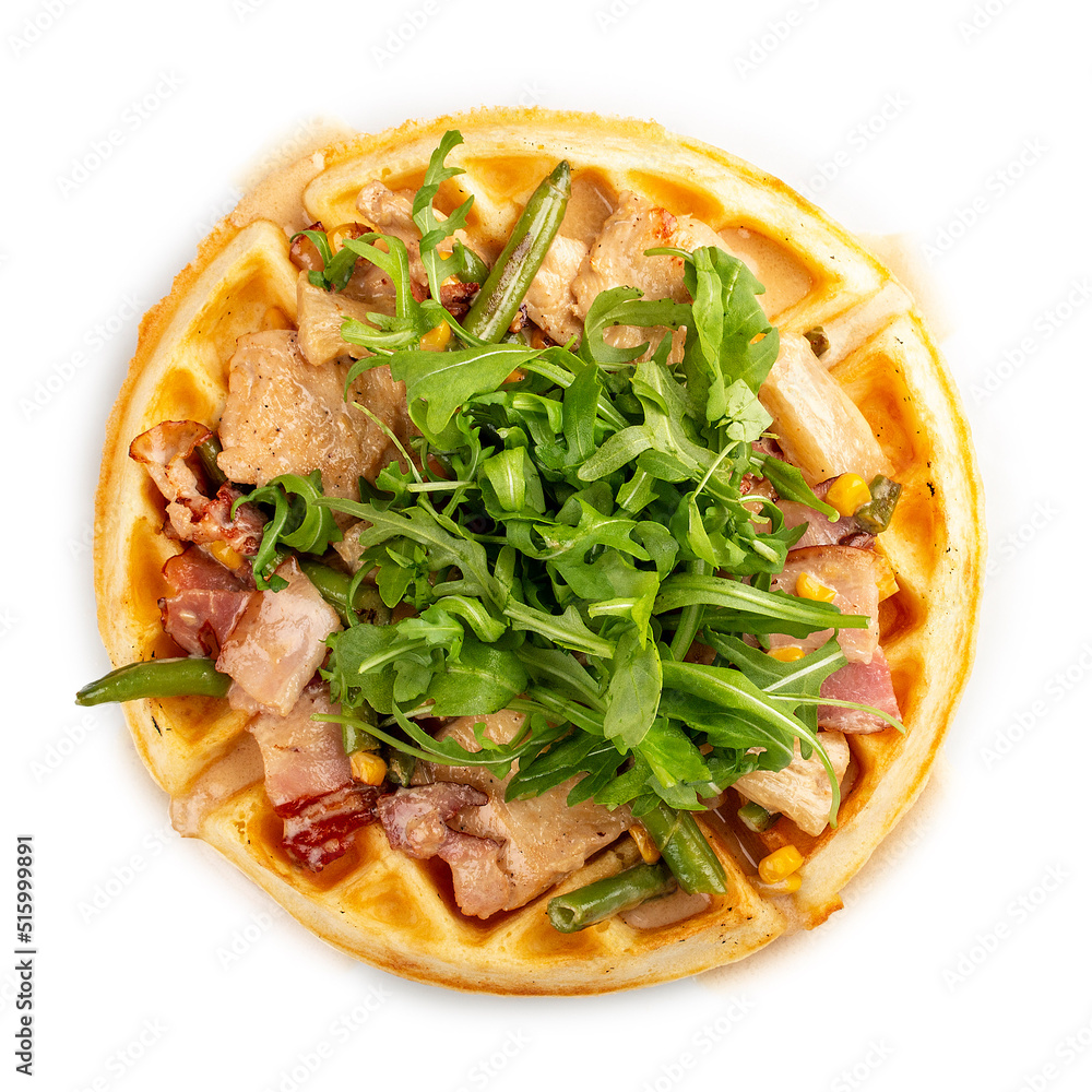 American Round Waffle. With bacon, chicken and arugula. On a white background, isolated. American Round Waffle. With bacon, chicken and arugula. On a white background, isolated.